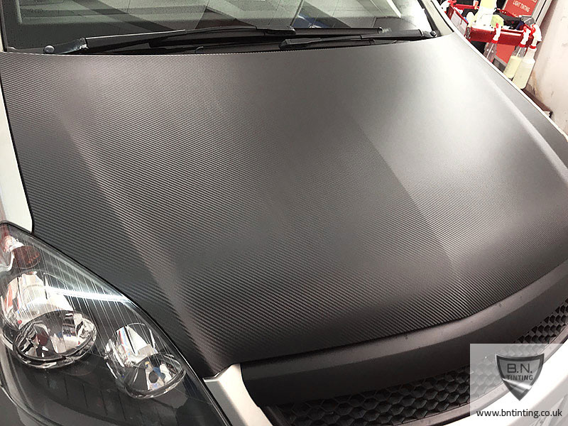 Gallery image shows vinyl closeup B.N.Window Tinting & Car Wrapping